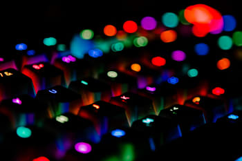 blue and purple lights on black background