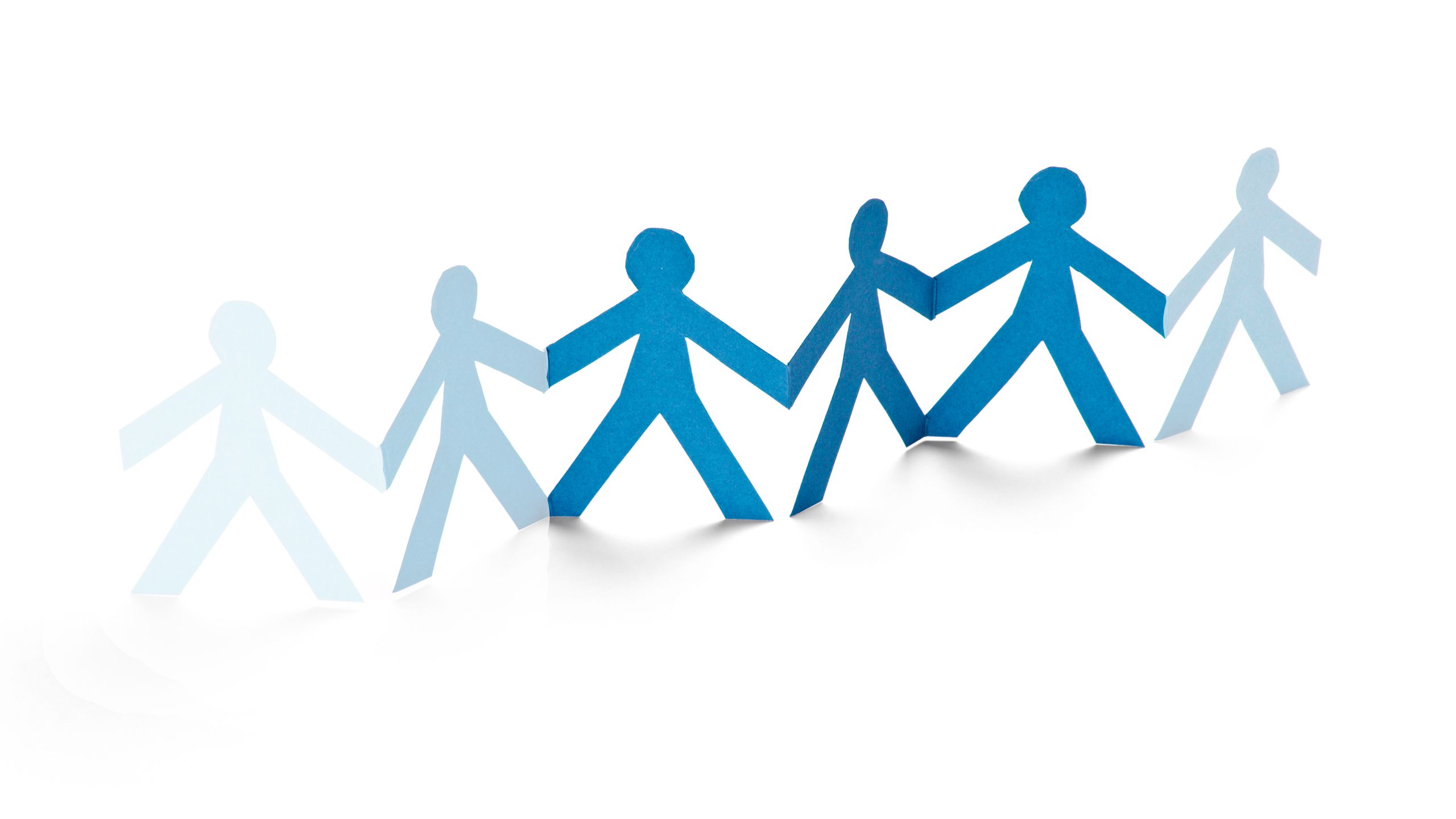 Paper people attached in a line slowly fading out